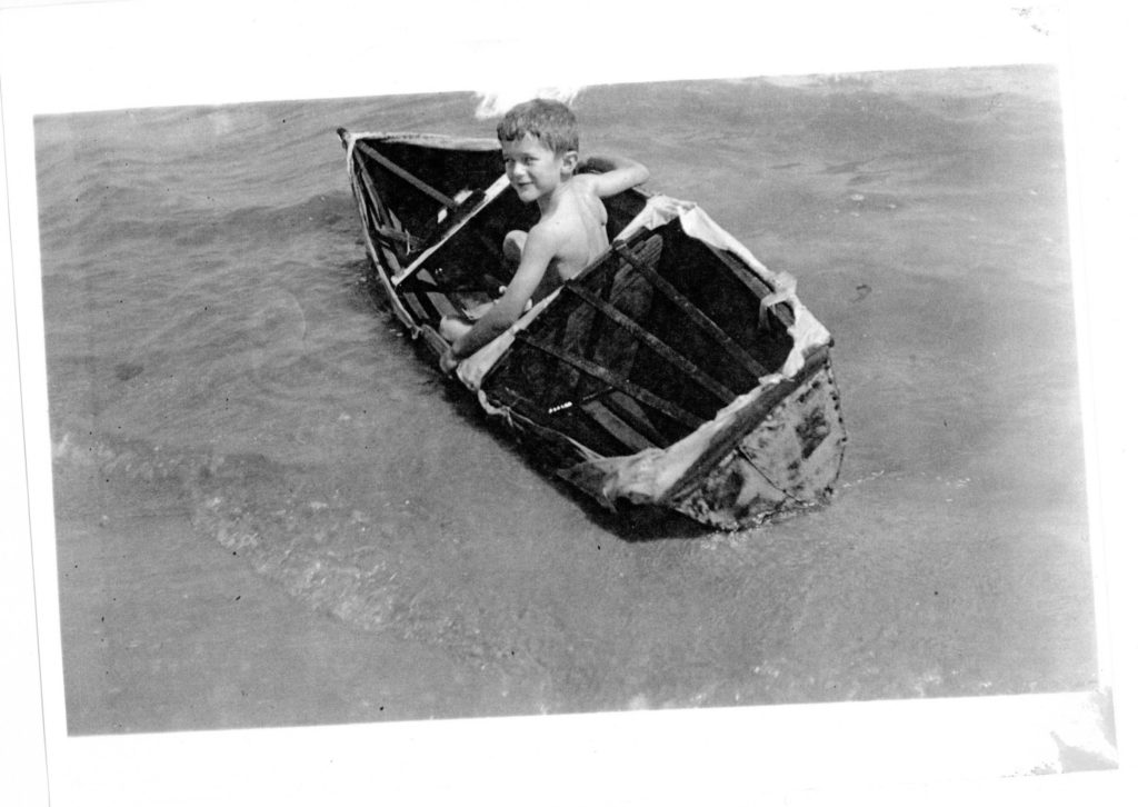 FLS_BoyInBoat Archive Document from F.L. Showalter History
