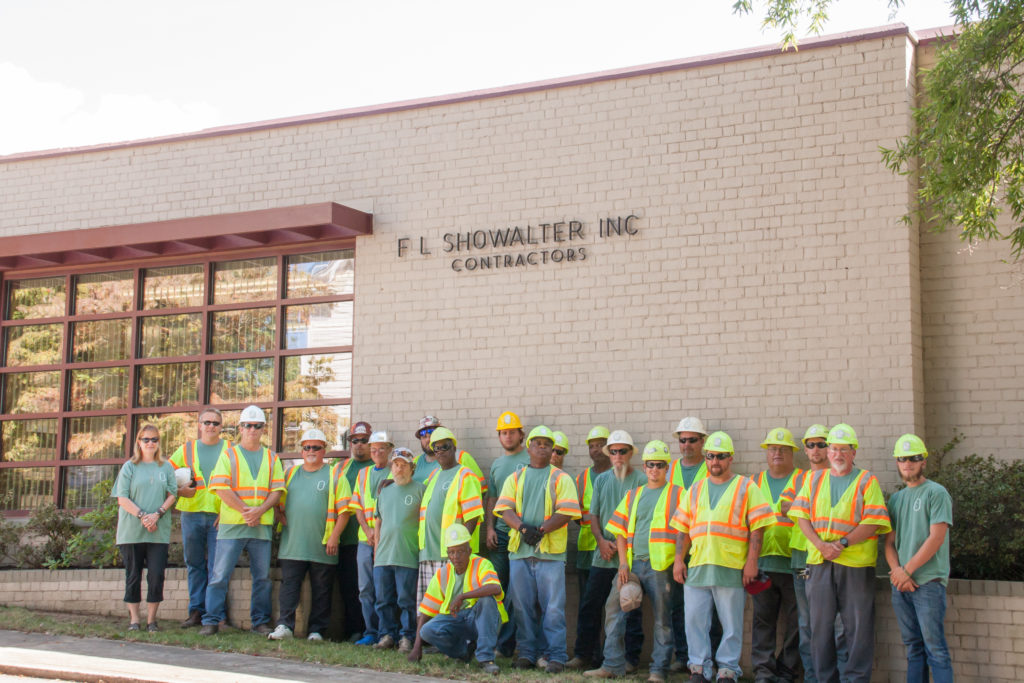 F.L. Showalter team standing outside headquarters